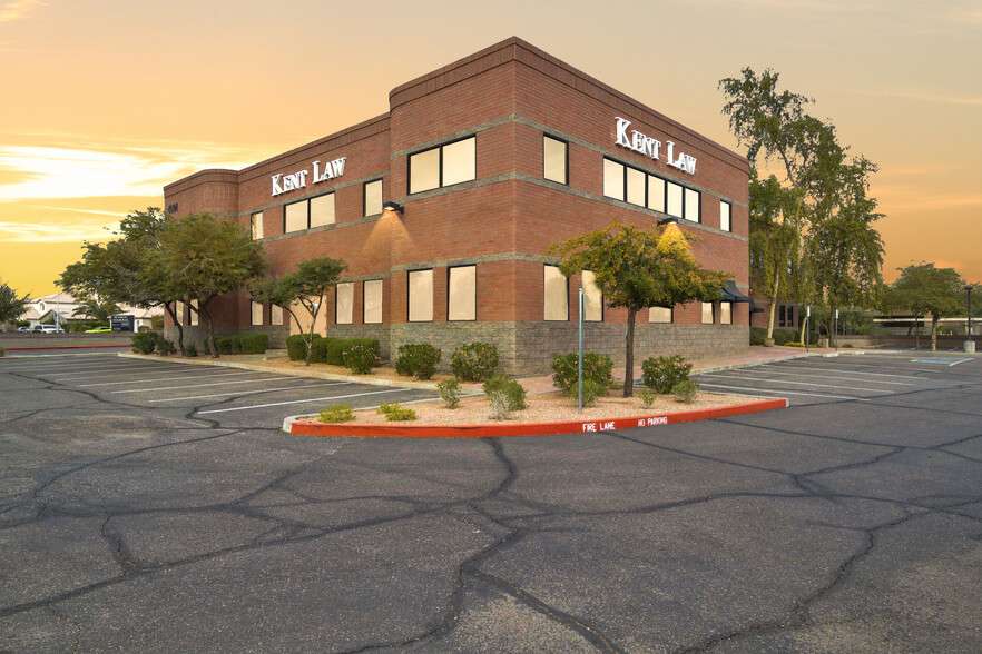 Kent Law office at 4001 E. Mountain Sky Ave. in Ahwatukee, Phoenix, with KENT LAW signs on the brick building at sunset
